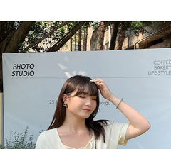 Short-Sleeve U-Neck Tie-Accent
Knit Top