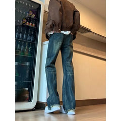 Mid Rise Washed Distressed Flared Jeans