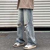 Mid Rise Washed Distressed Loose Fit Jeans