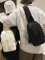 Multi-Pocket Sling Bag