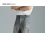 Mid Rise Washed Distressed Wide Leg Jeans