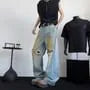 Mid Rise Distressed Washed Wide Leg Jeans