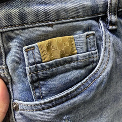 Mid Rise Washed Distressed Denim Shorts