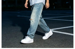 Distressed Tapered Jeans