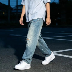 Distressed Tapered Jeans