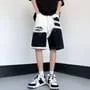 Mid Rise Distressed Panel Denim Shorts
